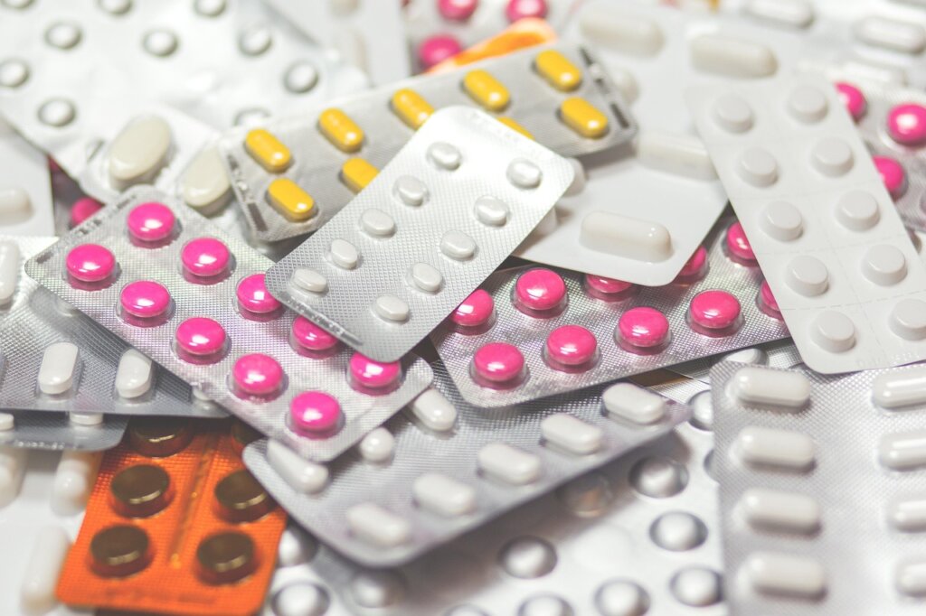 hospital pharmacy counter with prescription bag