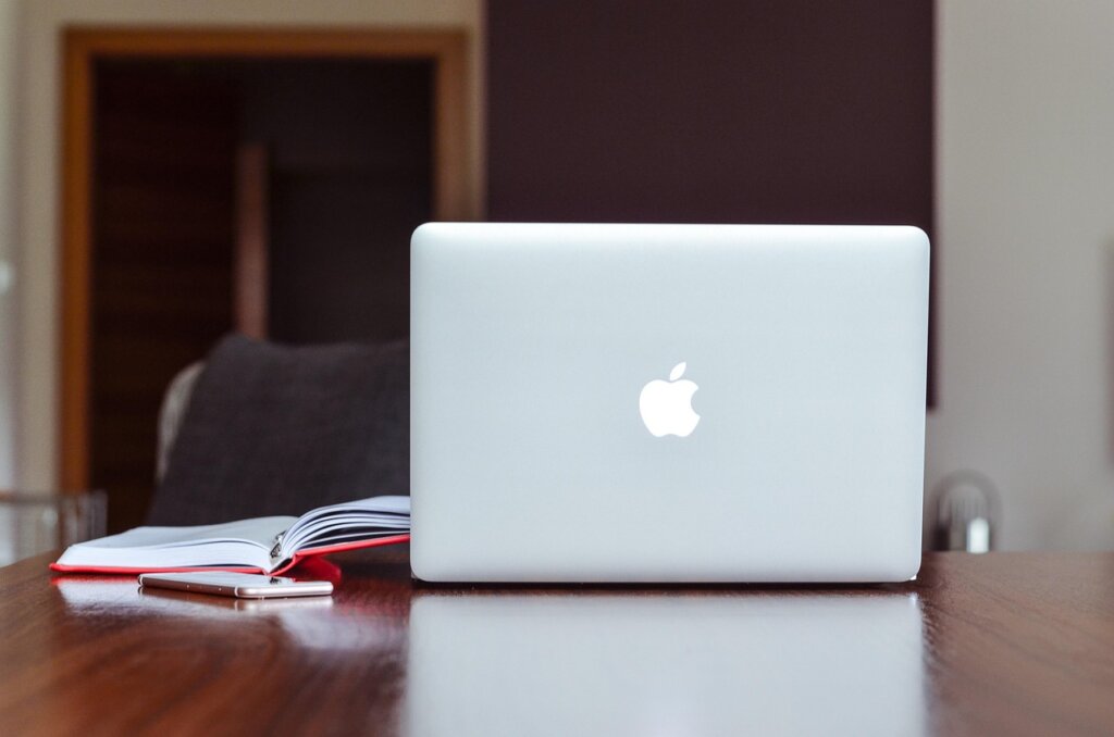 online financial education course on laptop at home desk