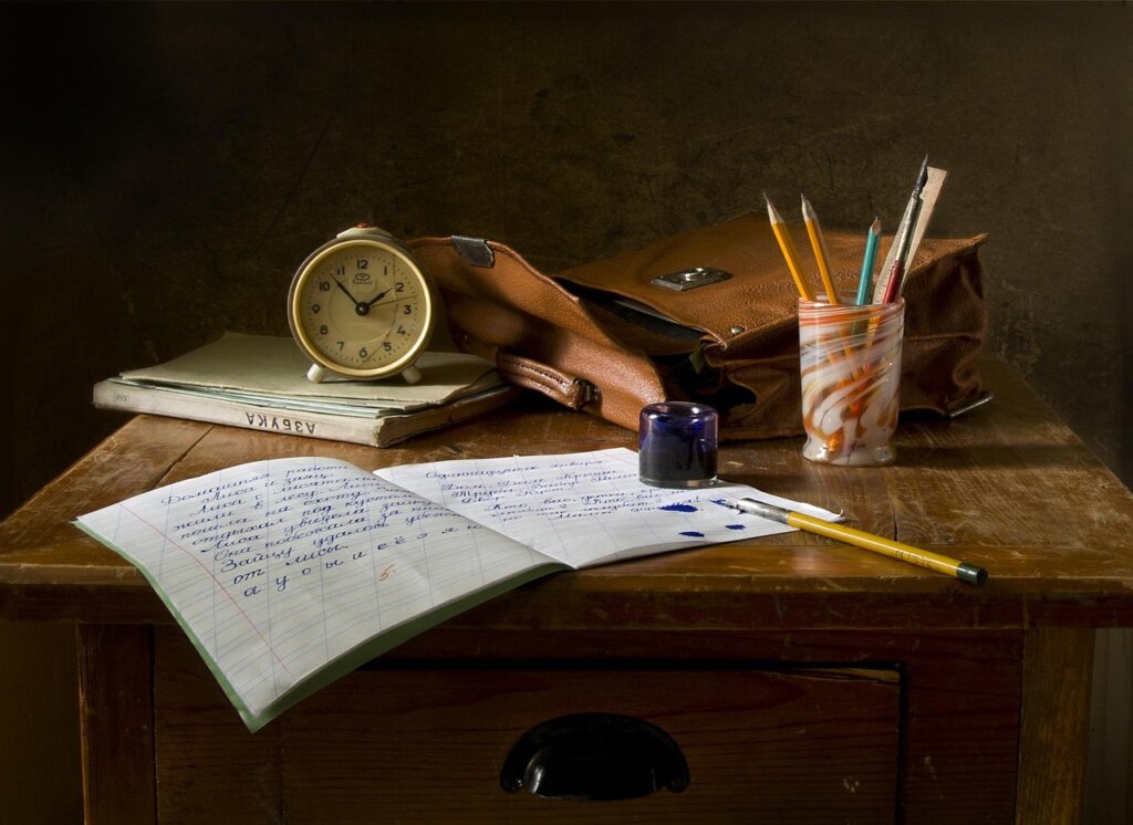 policy fund loan approval letter on desk with glasses