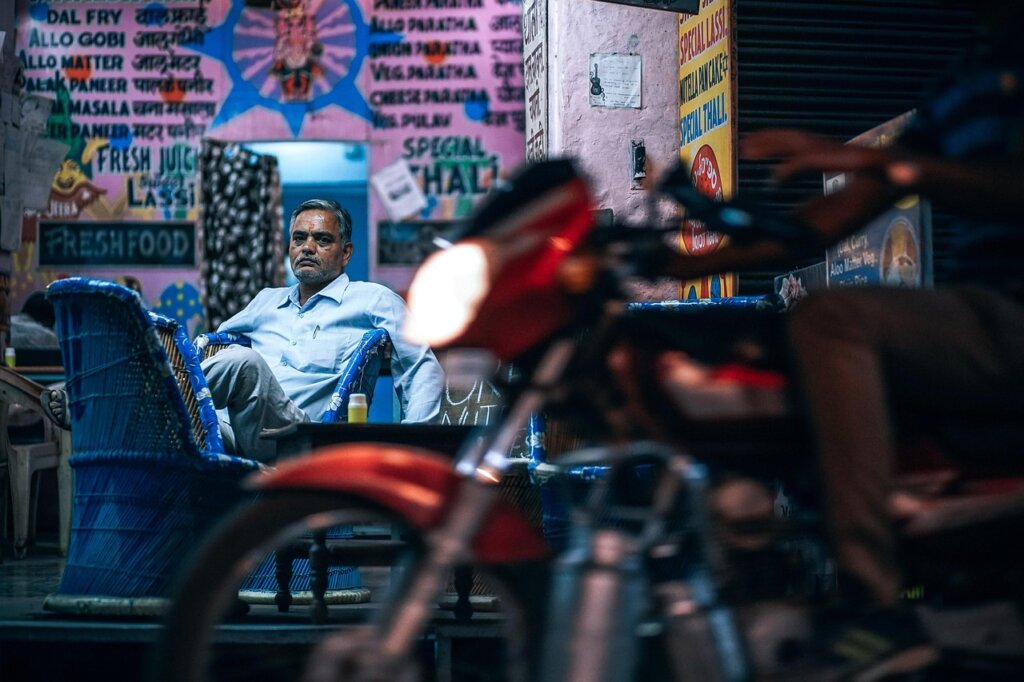 small cafe owner reviewing business finances at counter