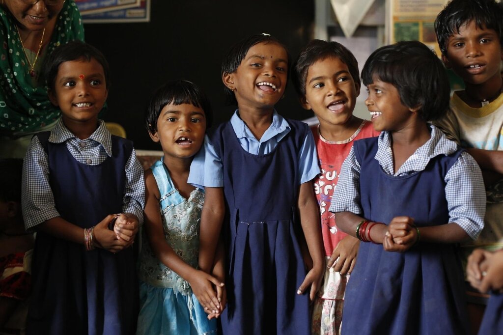 children attending after-school program in bright classroom