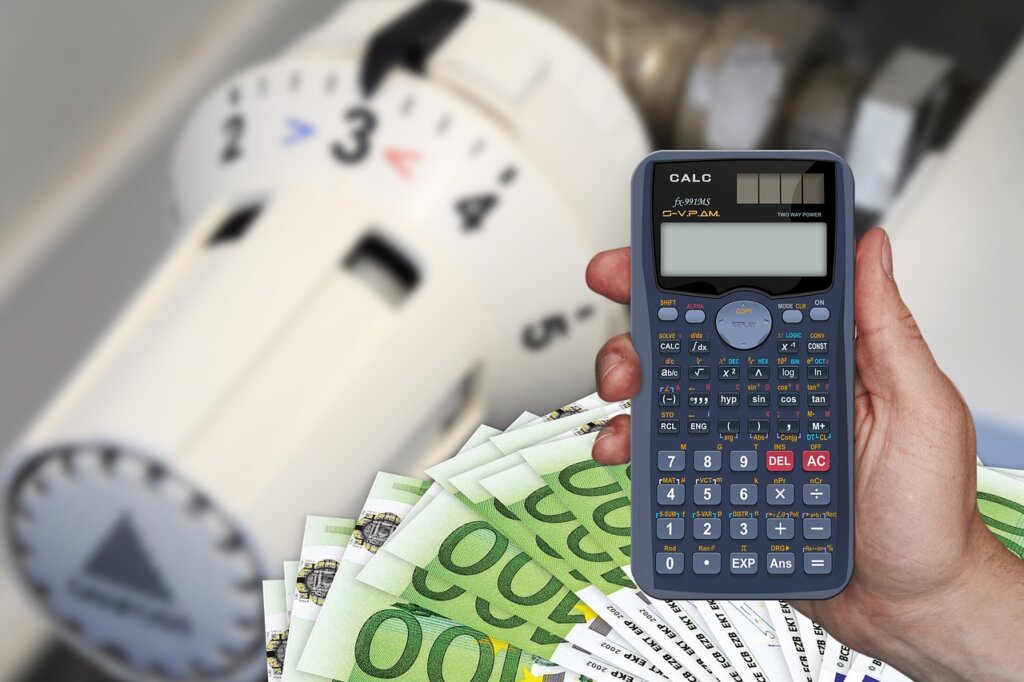 parent reviewing monthly budget and education cost savings