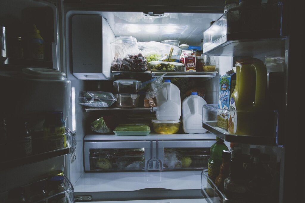baking soda open box placed inside refrigerator shelf