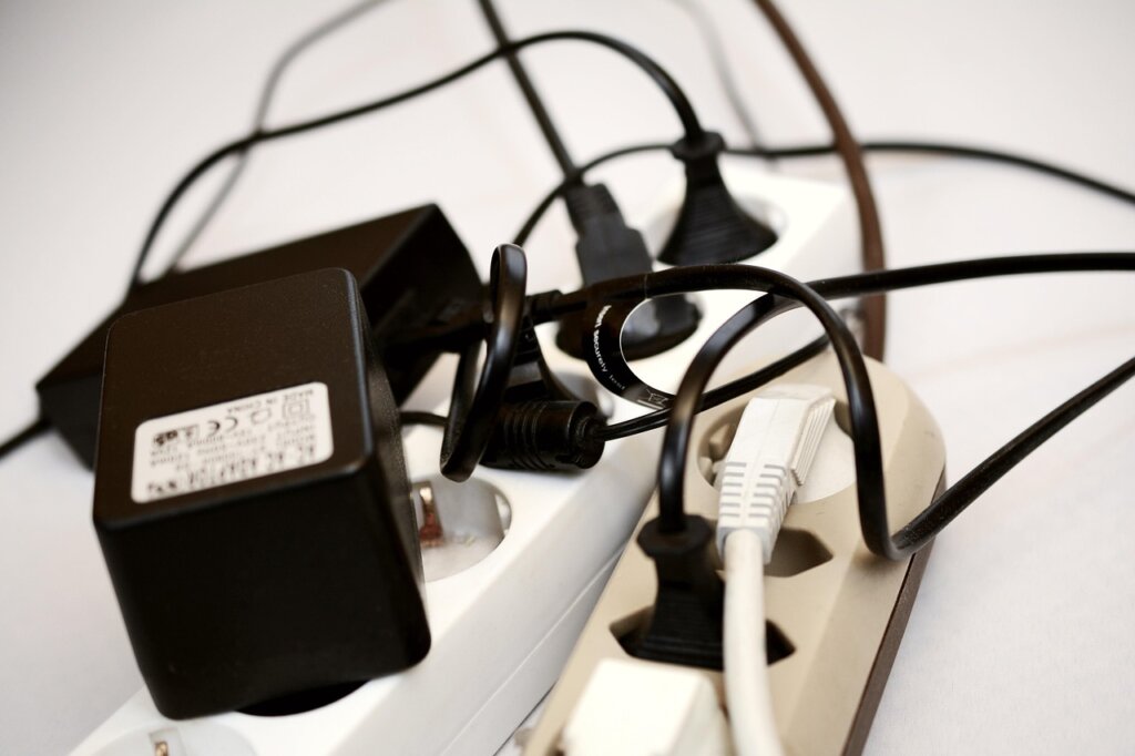 power meter plug adapter connected to appliance outlet