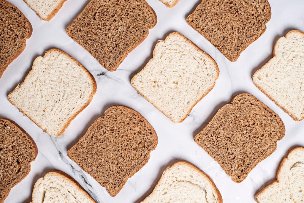 moldy bread close-up on white background