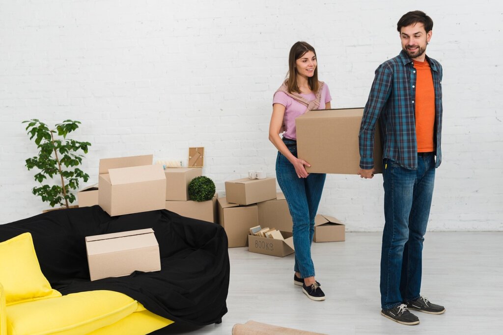 colorful packing tape labels on cardboard boxes for moving organization