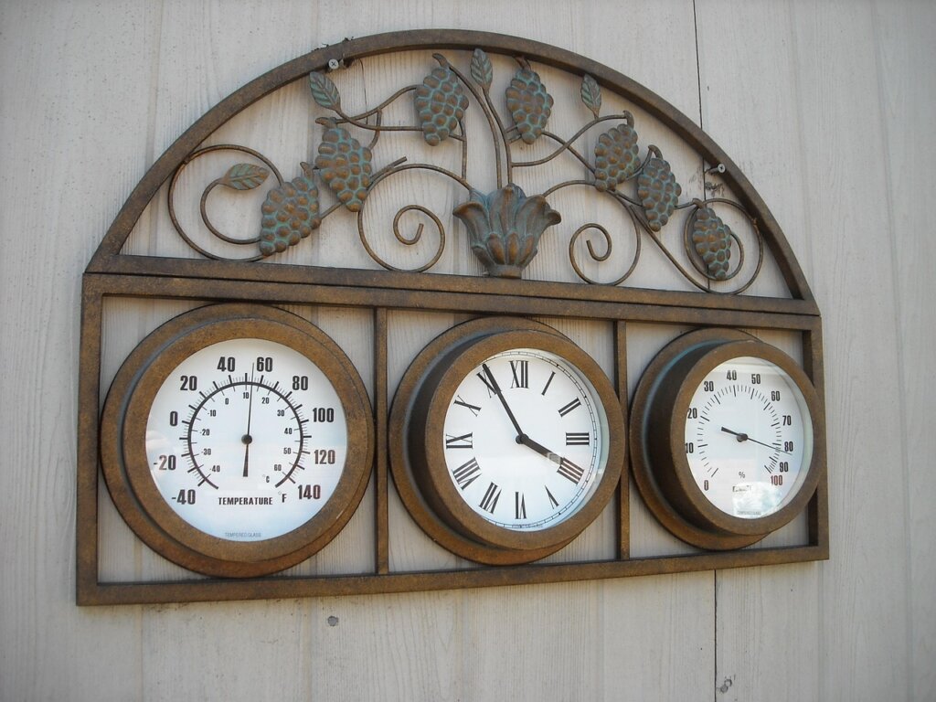 thermometer and hygrometer on balcony floor before painting
